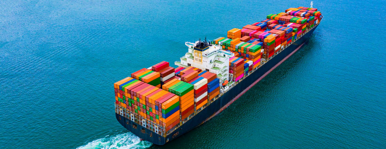 Cargo containers ship logistics transportation Container Ship Vessel Cargo Carrier. import export logistic international export and import services export products worldwide